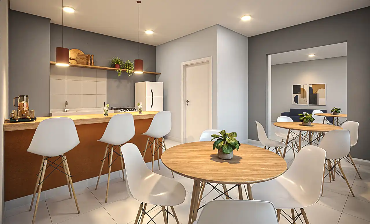 Espaço gourmet com bancada, banquetas e mesas redondas