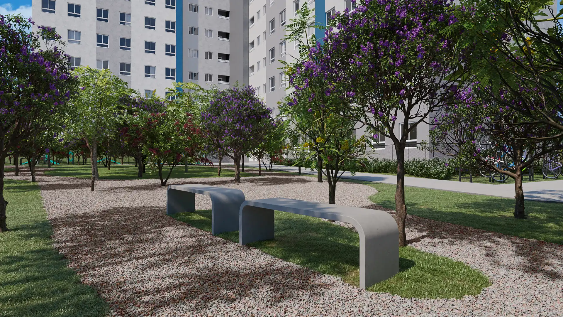Bosque com bancos de concreto entre árvores floridas